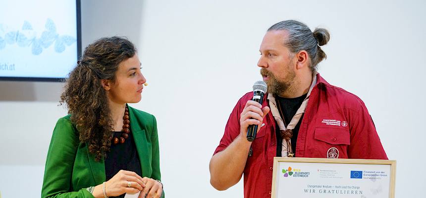 Diego del Pozo (Pfadfindergruppe Perchtoldsdorf) erklärt die Hintergründe des Projektes. © Christan Hofer/Robert Harson für REWE